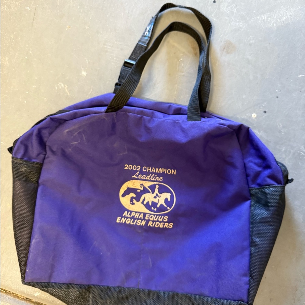 World class equine Purple and Black bag